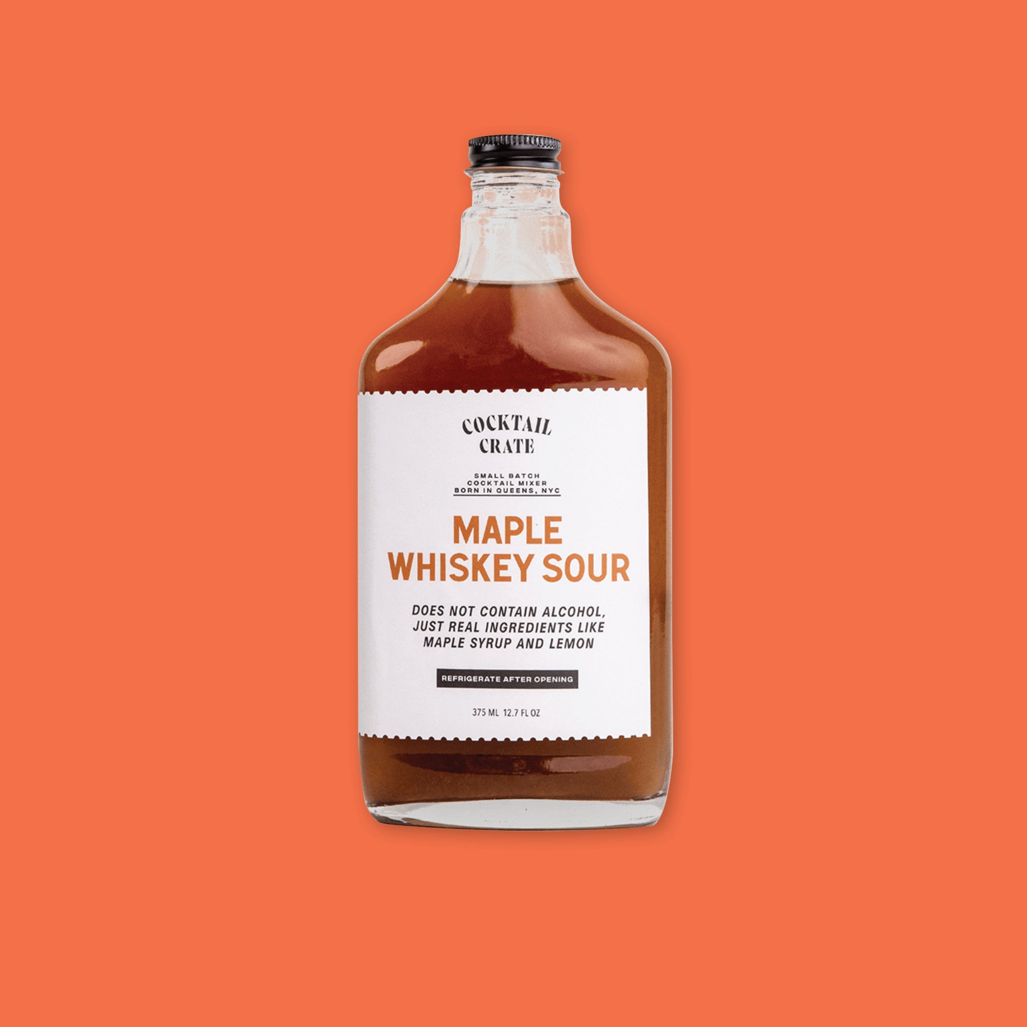On an orangey-red background sits a jar. This COCKTAIL CRATE clear jar has a black lid and white label with brown syrup inside. It says "MAPLE WHISKEY SOUR" in a rust, all caps block font. It also says "DOES NOT CONTAIN ALCOHOL, JUST REAL INGREDIENTS LIKE MAPLE SYRUP AND LEMON" in black, all caps block italic font. In a black box it says "REFRIGERATE AFTER OPENING"  in white, all caps block font. 375 ML 12 FL OZ