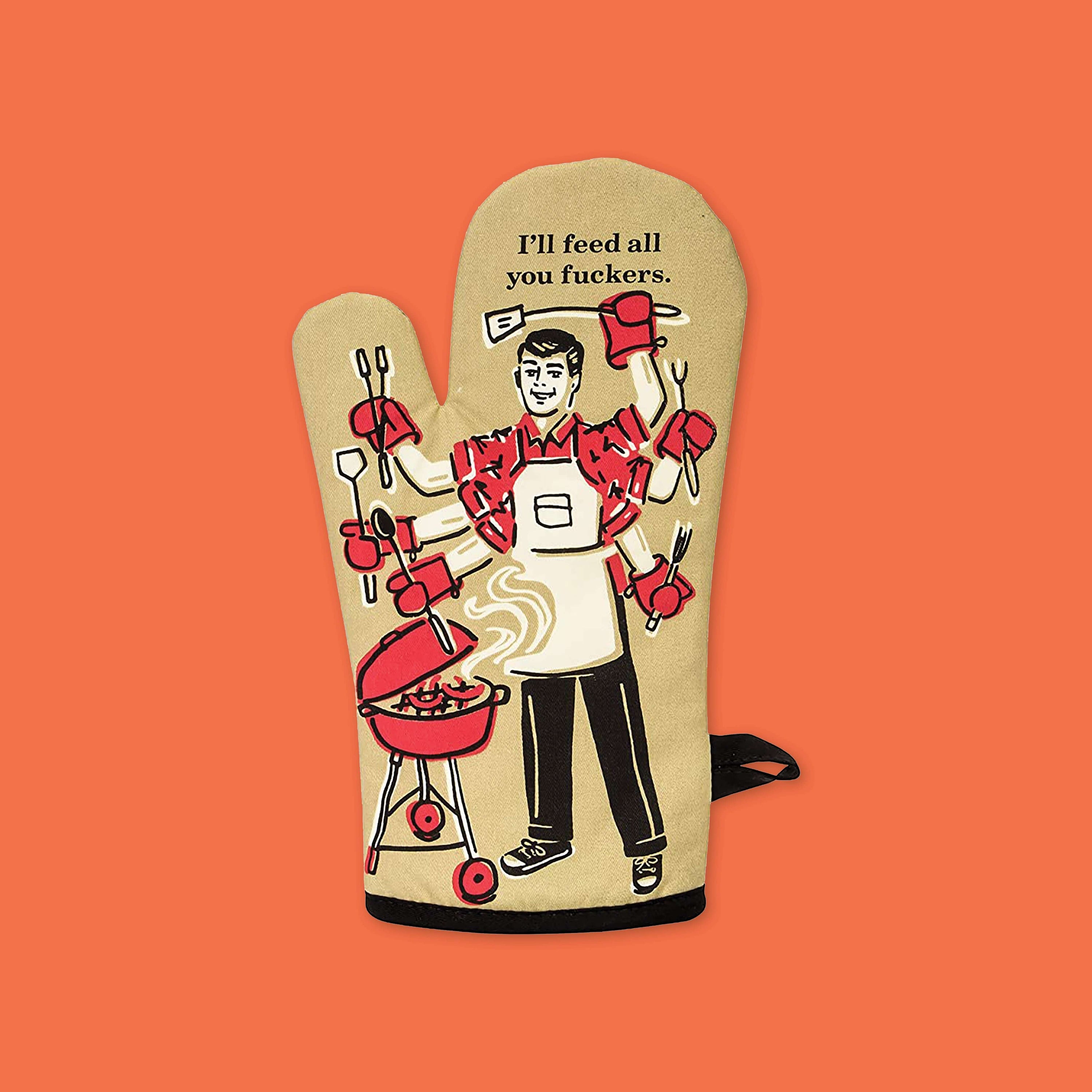 On an orangey-red background sits an oven mitt. The front of this khaki oven mitt has a vintage illustration of a man barbequing with six arms and hands. In each hand are bbq utensils. The colors are khaki, red, black, and white. At the top it says "I'll feed all you fuckers." in black serif font.