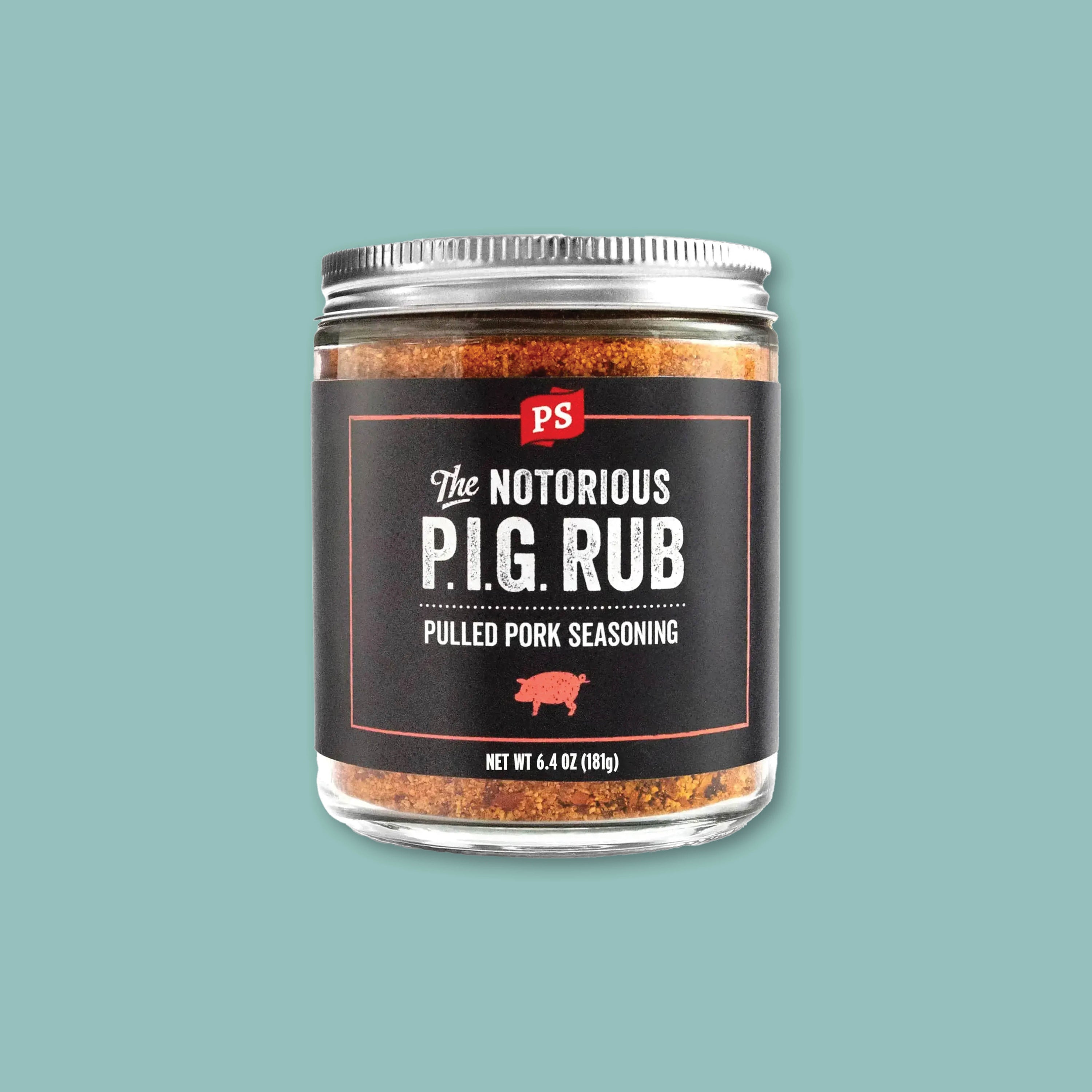 On a teal background sits a jar of The Notorious P.I.G Rub Pulled Pork Seasoning with a black label and aluminum lid.