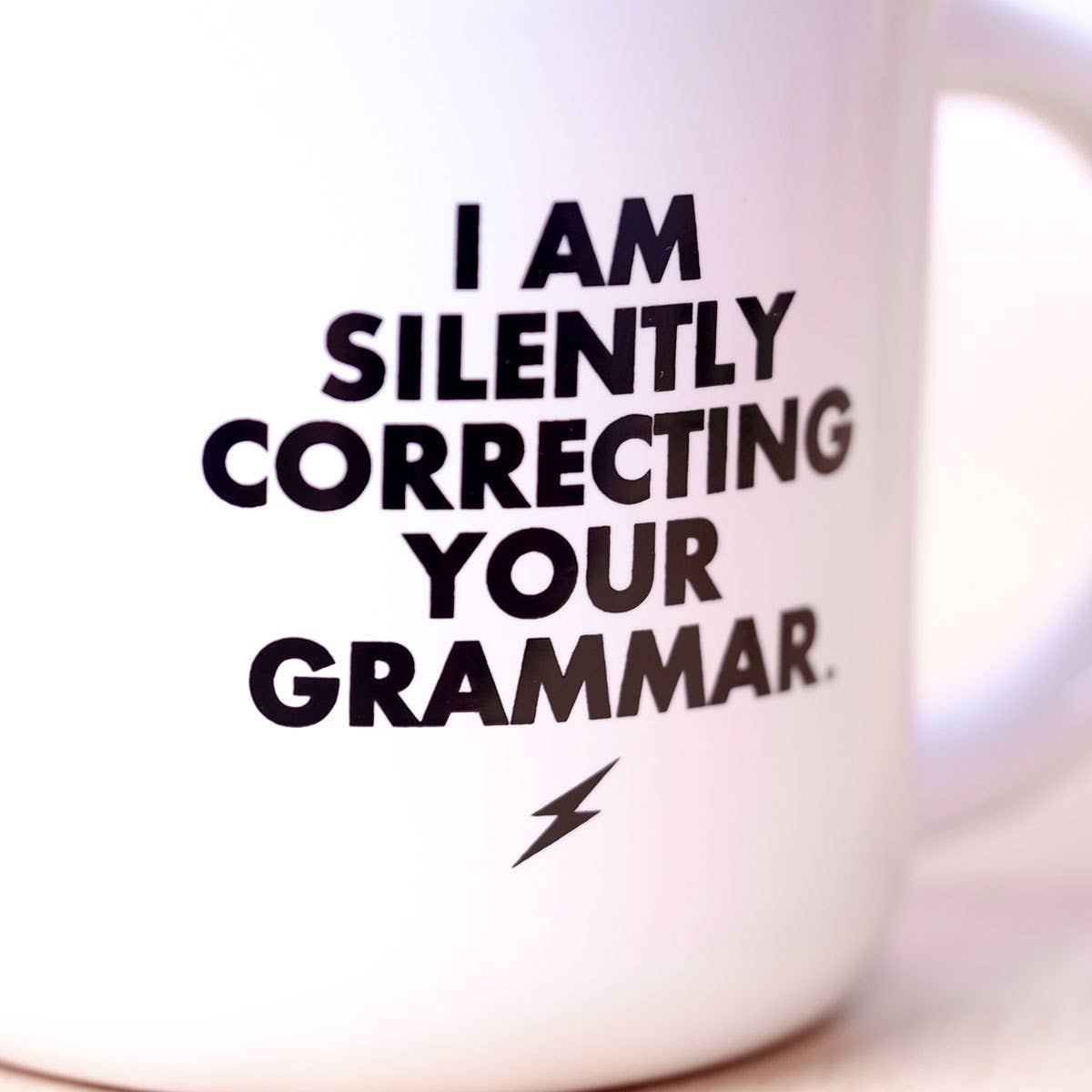 I am silently correcting your grammar... Ceramic Mug.  Case