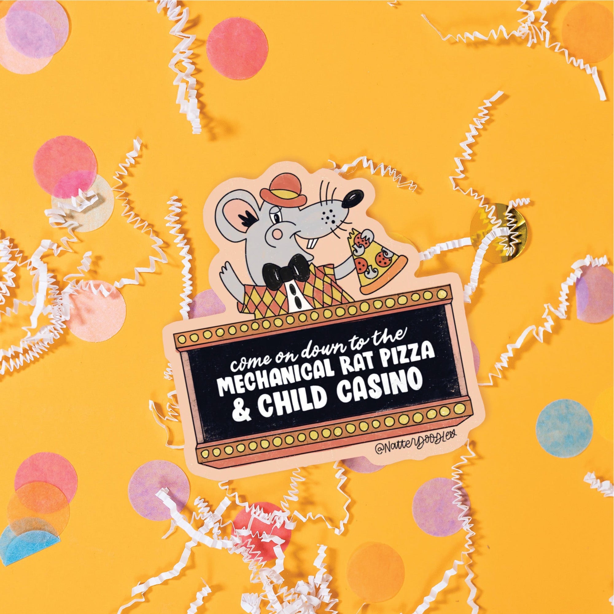 On a sunny mustard background sits a sticker with white crinkle and big, colorful confetti scattered around. This Chuck E. Cheese inspired colorful sticker has an illustration of a rat eating a slice of pizza above a black marquee with lights. It says "come on down to the MECHANICAL RAT PIZZA  & CHILD CASINO" in white handwritten lettering.