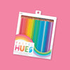 On a bubblegum pink background sits a box of pencils. This box includes 24 soft-hued colored pencils. It says "PASTEL HUES" in a colorful, all caps font.