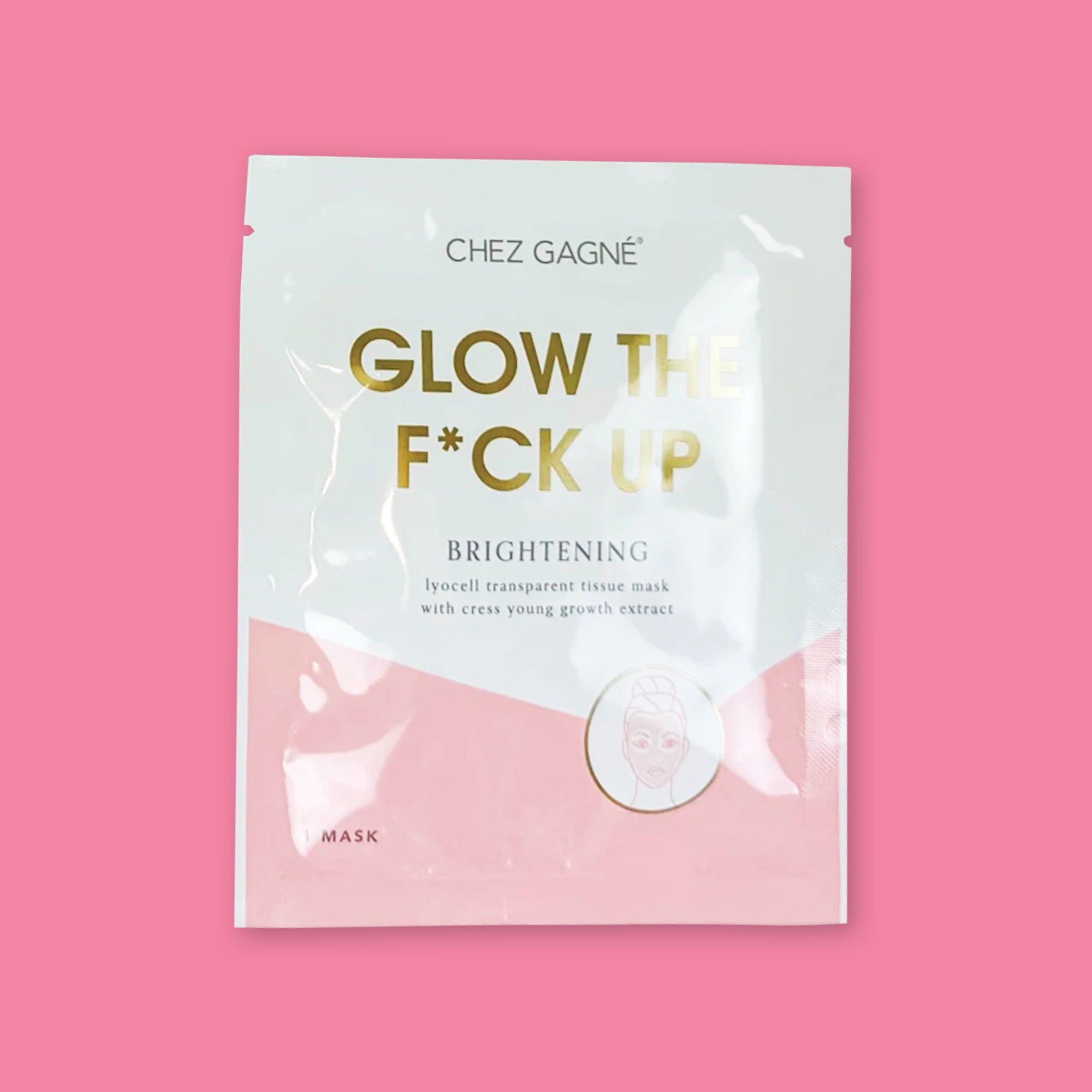 On a bubblegum pink background is a package. It is white and light pink and has an illustration of a woman's face with a mask on it. It says "CHEZ GAGNE" in black, all caps font. It also says "GLOW THE F*CK UP" in gold, all caps block font. "Brightening lyocell tranparent tissue mask with cress young growth extract" in black, serif font. 1 mask