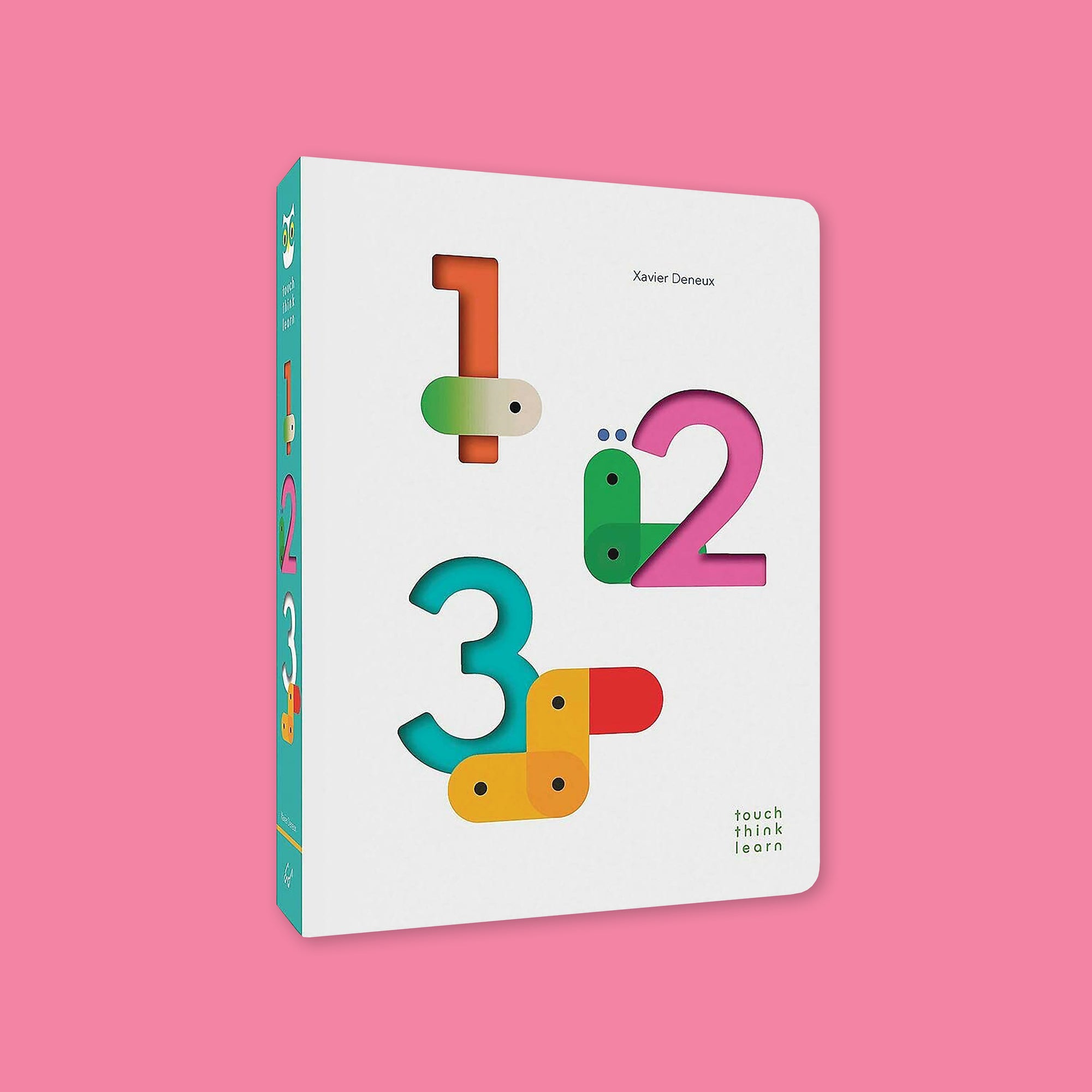 On a bubblegum pink background sits a book. This book features the colorful 1-2-3 "Touch-Think-Learn" board book by Xavier Deneux.