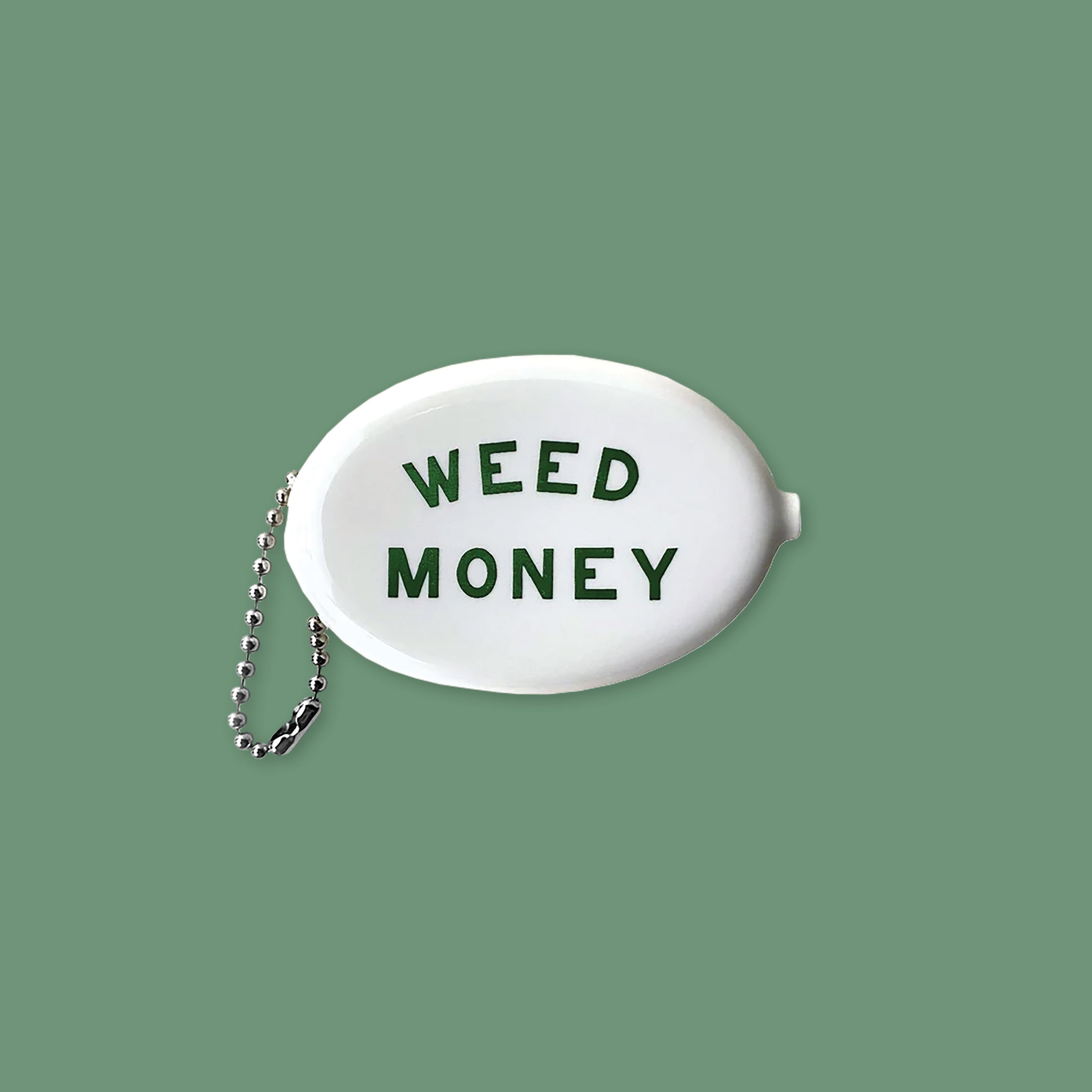 On a mossy green background sits a white coin purse. It says "WEED MONEY" in dark green, all caps block font.