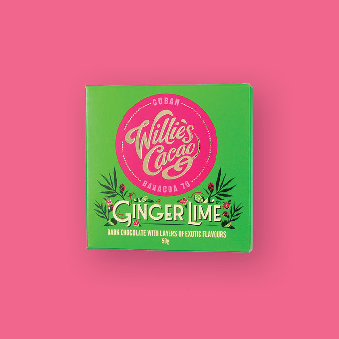 On a hot pink background sits a lime green package. It has illustrations of limes, flowers, and leaves. It has a hot pink circle label on the front. It is Willie's Cacao Cuban Baracoa 70 "GINGER LIME DARK CHOCOLATE WITH LAYERS OF EXOTIC FLAVORS." 50g