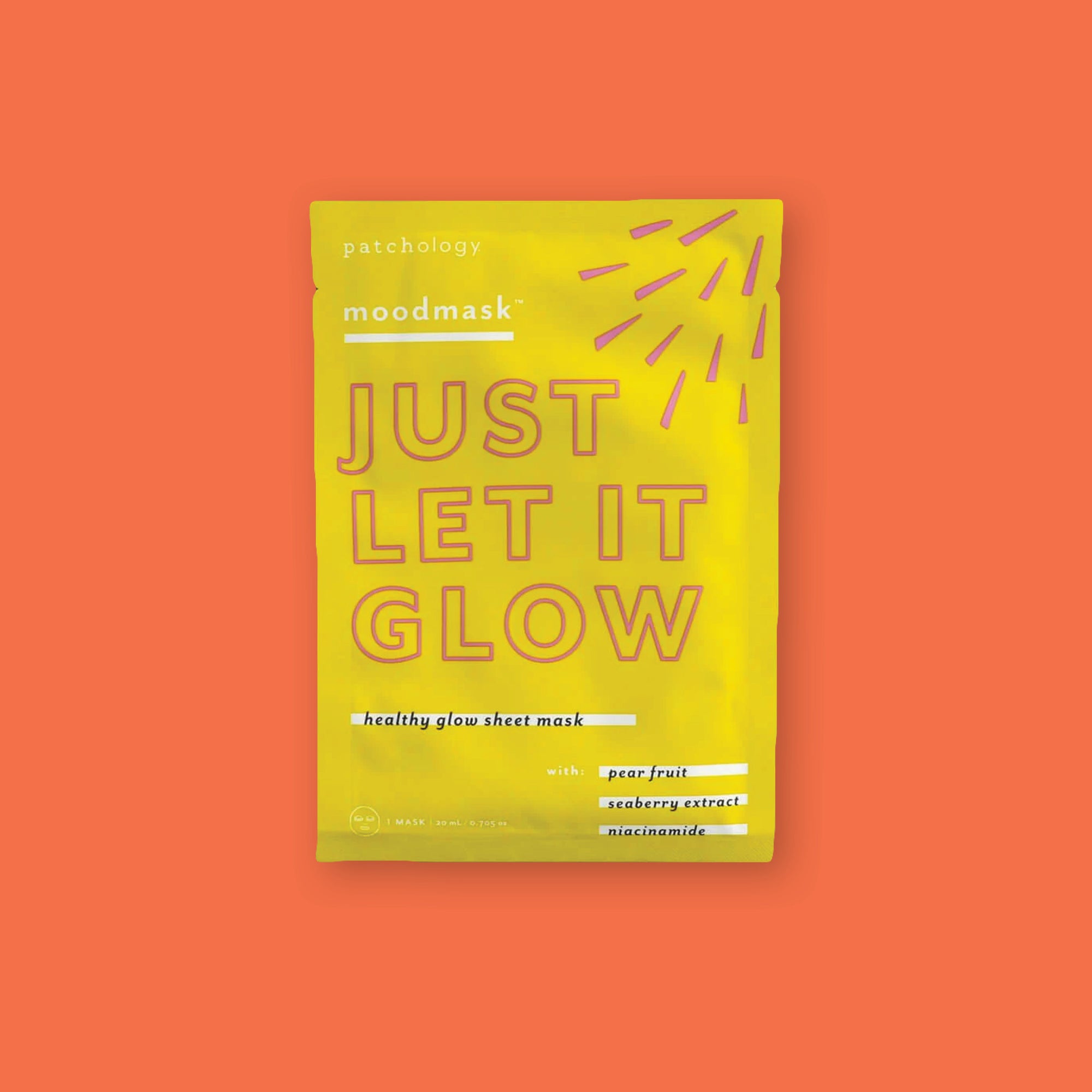 On an orangey-red background sits a package. The yellow package says "JUST LET IT GLOW" in a pink outlined, block font. It says "healthy glow sheet mask with pear fruit seaberry extract niacinamide" in black, serif italics font with white blocks behind the wording. 1 mask