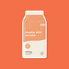 On an orange background sits an ESW BEAUTY single-use face mask in orange packaging titled "Pumpkin Spice Oat Milk Calming Plant-based Milk Mask"