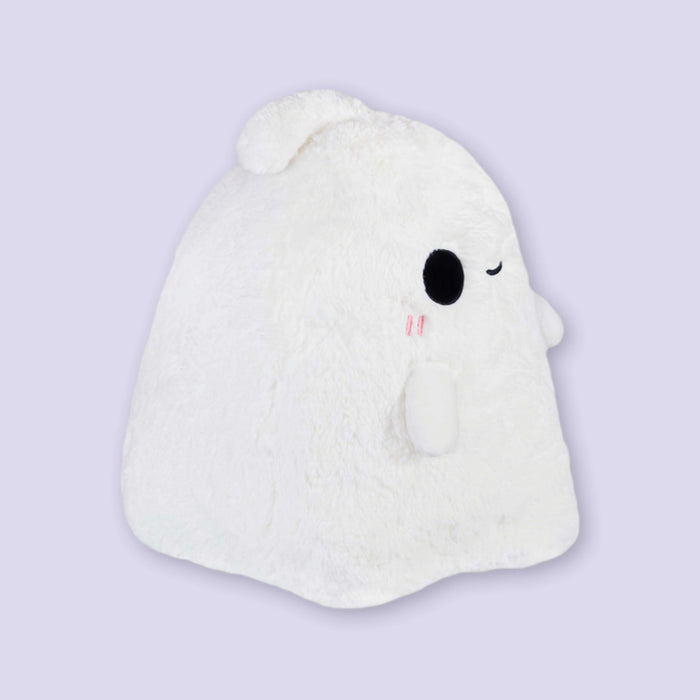 On a lavender background sits a side view of an adorable plush gost with a simple, adorable black animated face and a couple pink lines on each cheek.