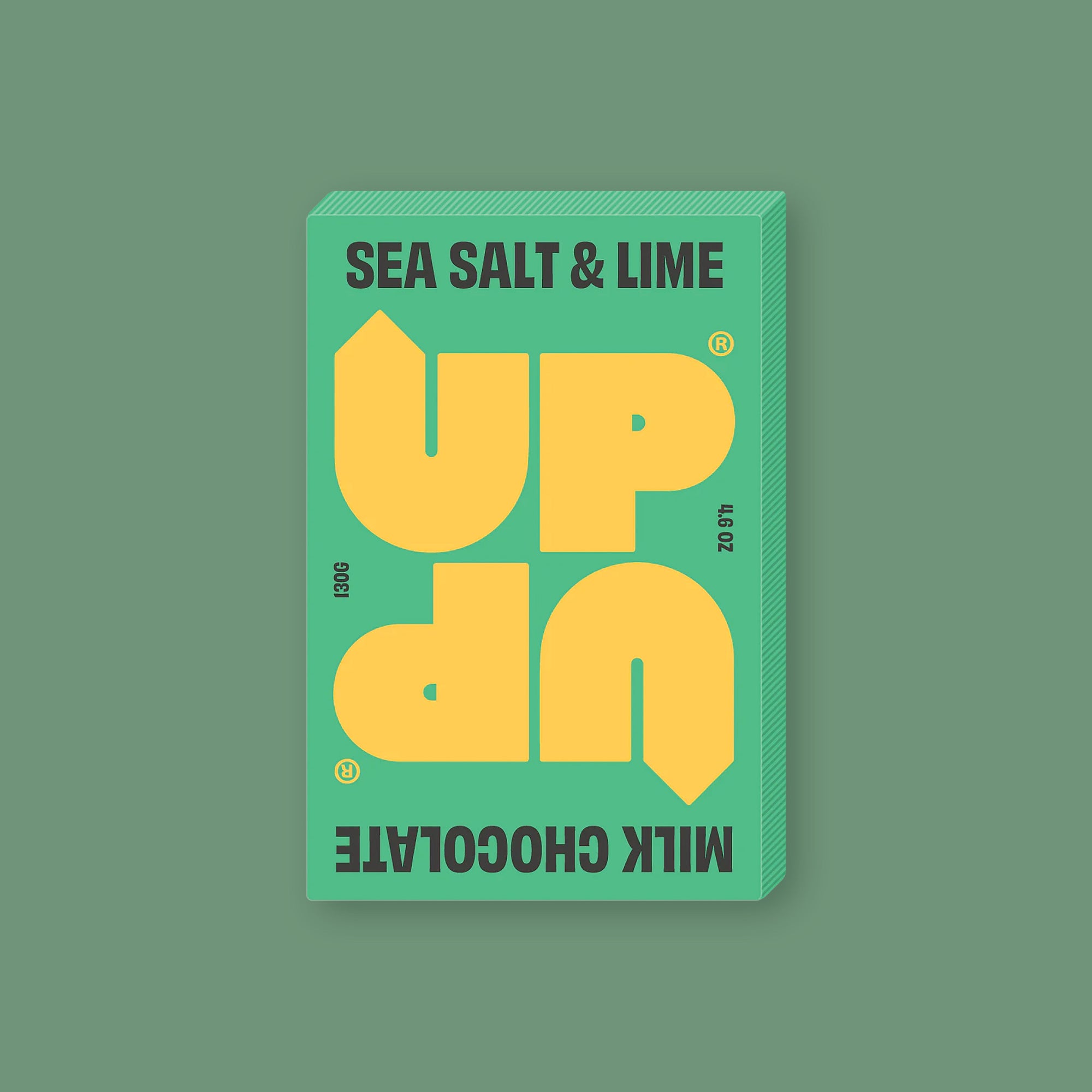 On a seafoam background sits a box of UP UP Sea Salt & Lime Chocolate. The packaging is in lime green and yellow. 