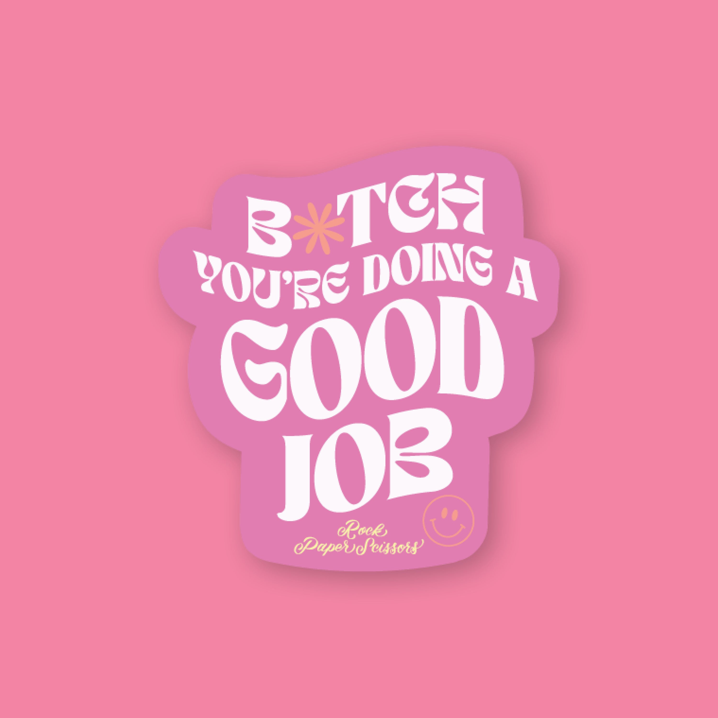 On a bubblegum pink background sits an RPS Exclusive purple sticker that says "B*tch You're Doing A Good Job" in a white, groovy font with "Rock Paper Scissors" handwritten below it in yellow with a smiley face.