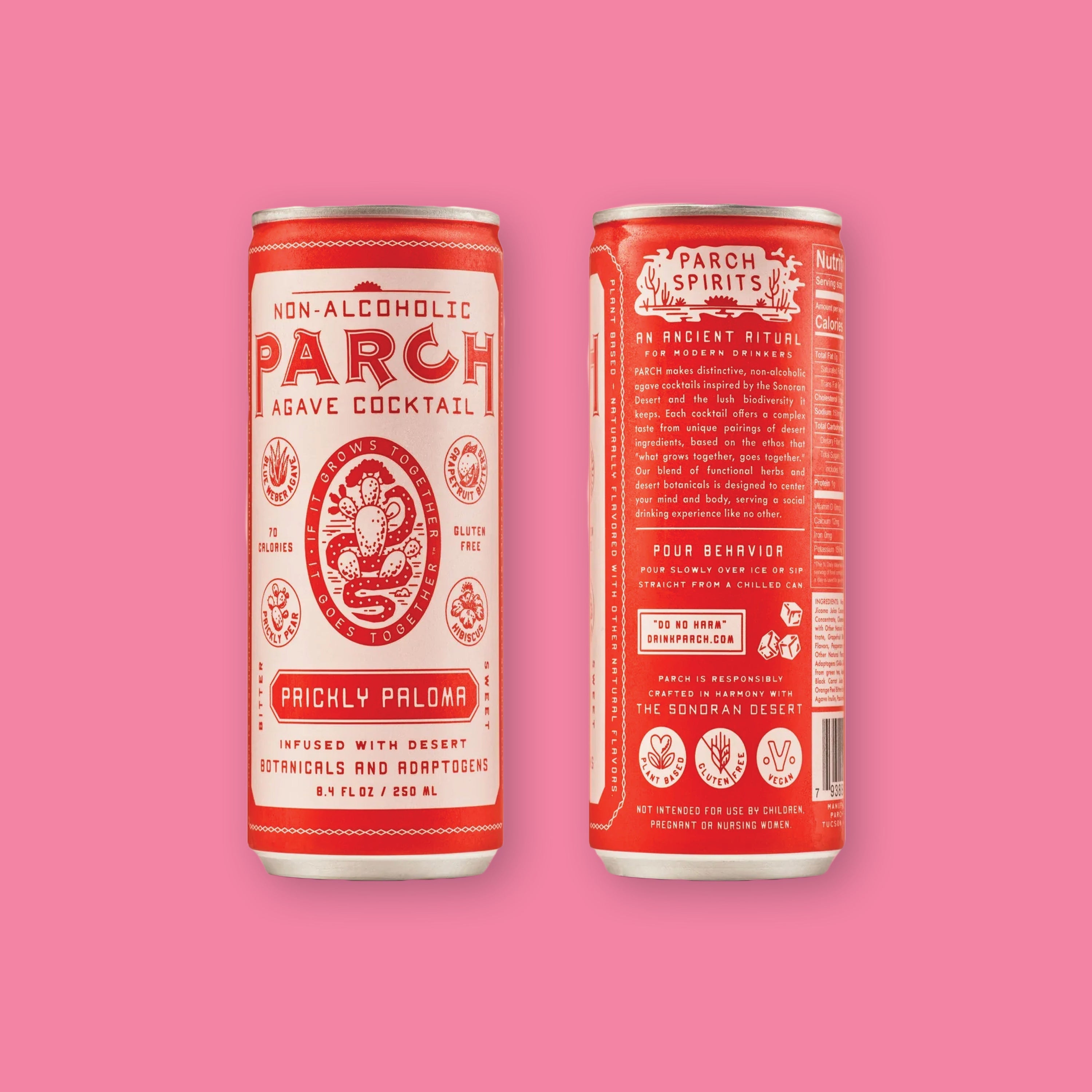 On a bubblegum pink background sits two cream and red cans of the Parch Non-Alcoholic Prickly Paloma Mix. The first can is the front and has an illustration of a cactus and snake on the front in red. The second can is the back. It is infused with desert botanicals and adaptogens, plant based, gluten free and vegan. 8.4 oz (250ml)