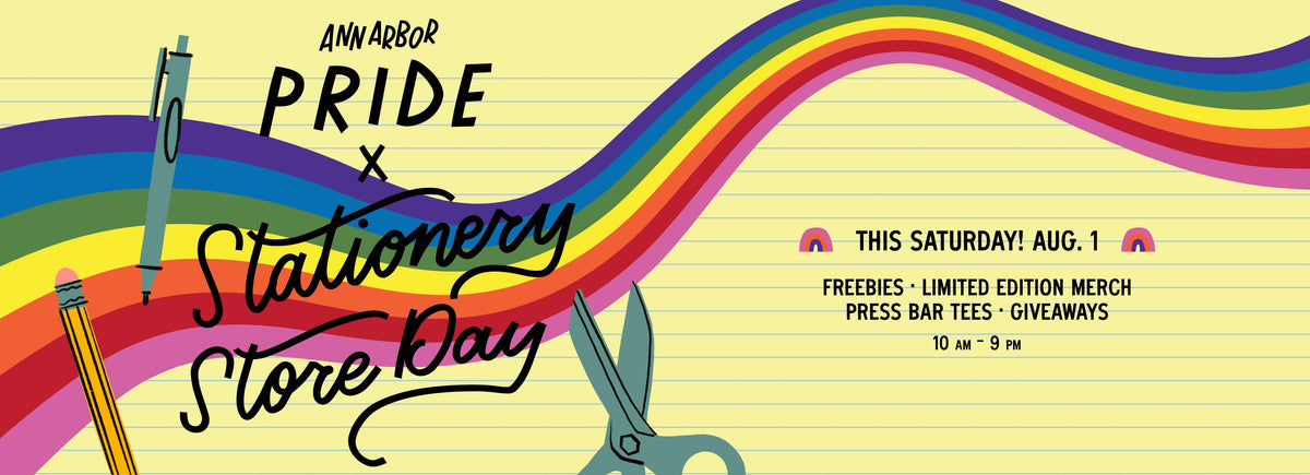 Promotional graphic for Ann Arbor Pride x Stationery Store Day, featuring a rainbow wave across lined yellow paper with illustrations of a blue pen, a yellow pencil, and teal scissors. Text lists event details for Saturday, Aug.