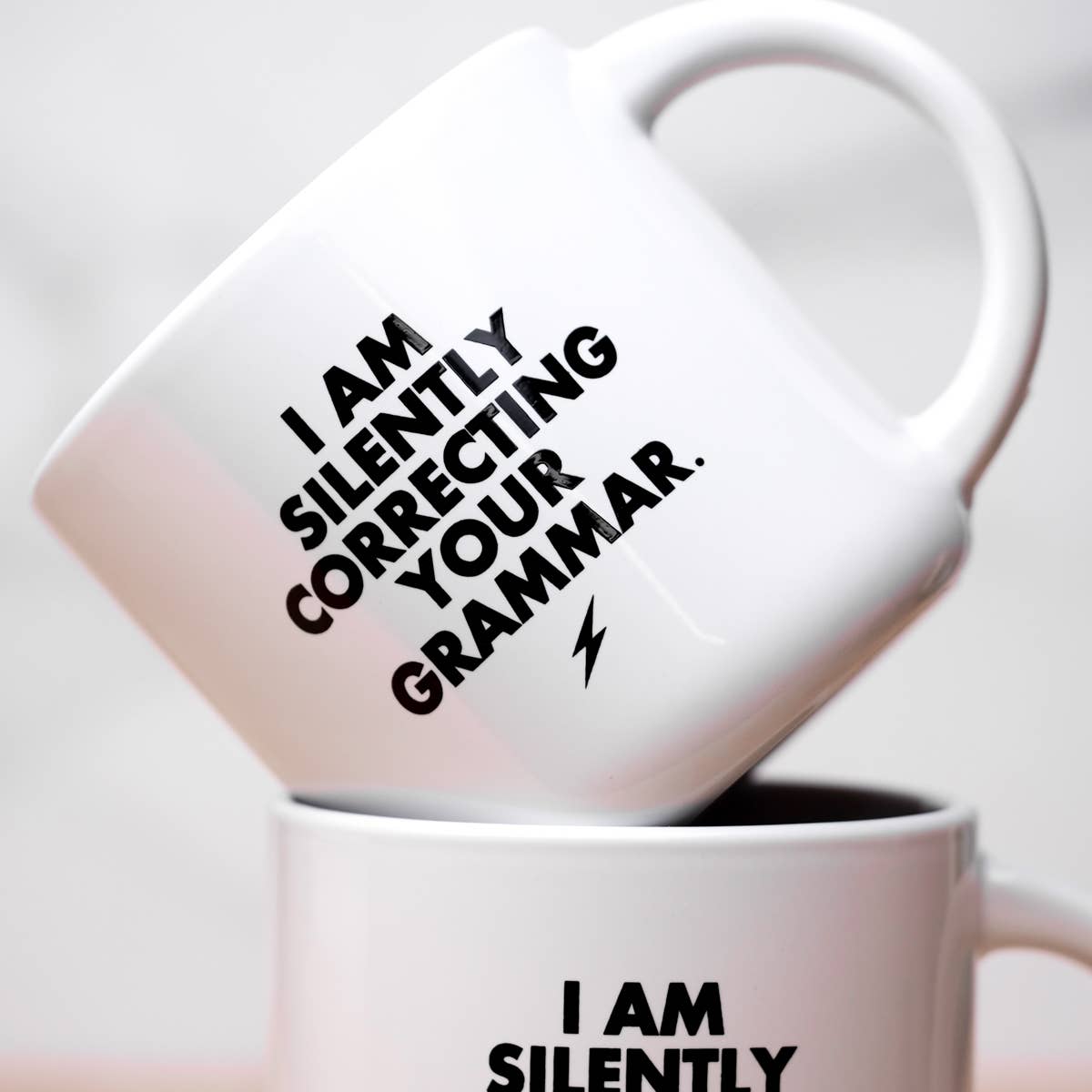 I am silently correcting your grammar... Ceramic Mug.  Case